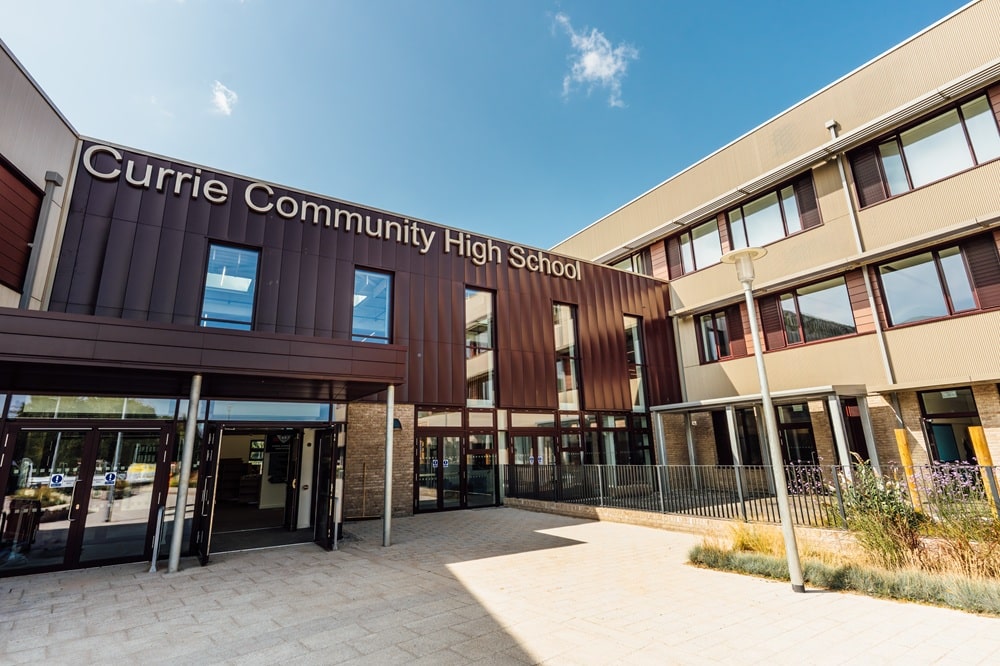 Completed Currie Community High School in Edinburgh built to Passivhaus standards with Armatherm 500 thermal breaks specified at column base connections to reduce heat loss and support net zero energy targets